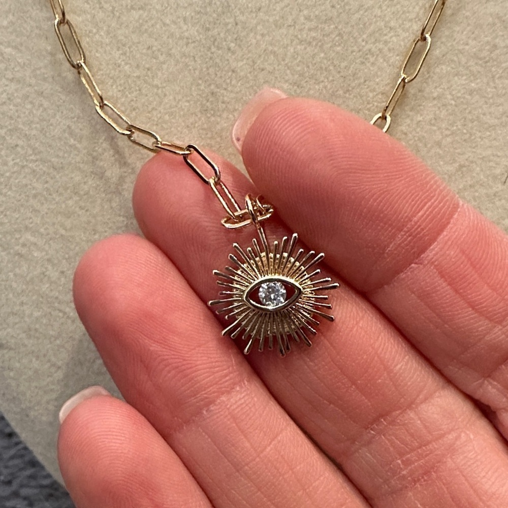 Joy Dravecky Elegant Gold Necklace with Sunburst Evil eye Pendant - Picture 3 of 4